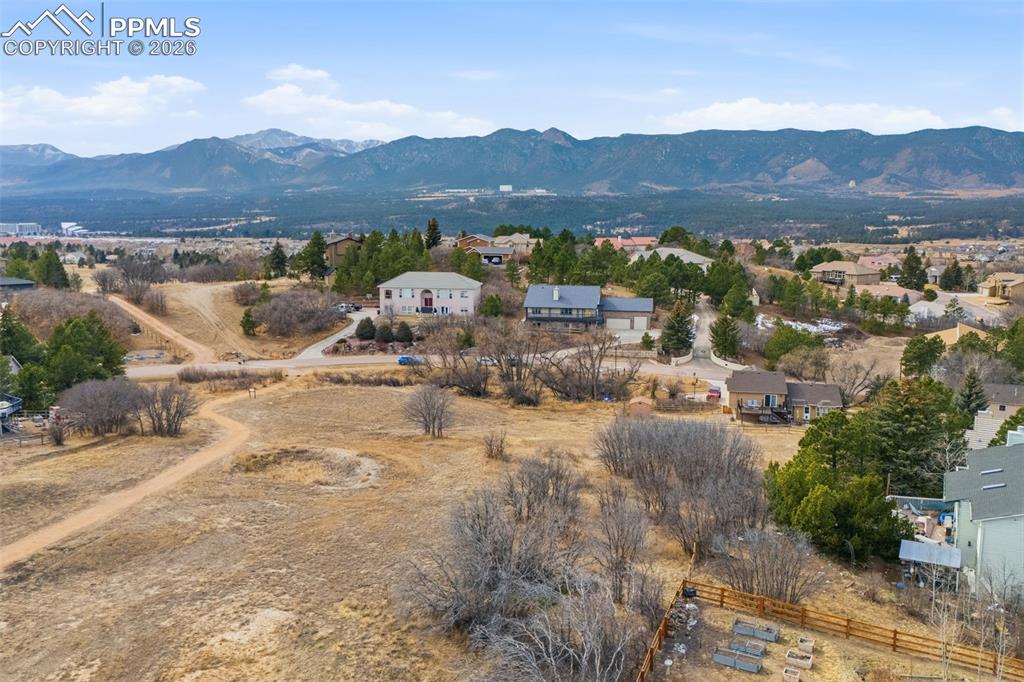 View of the park across the street from the front of the house. The walking trail continues to the southwest.