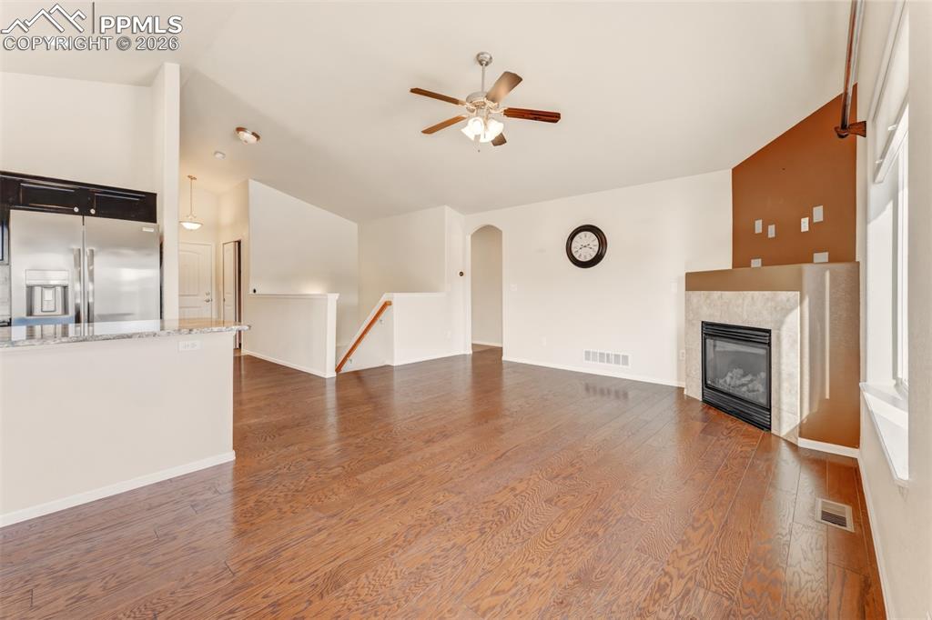Primary suite looking towards hallway and private bathroom.