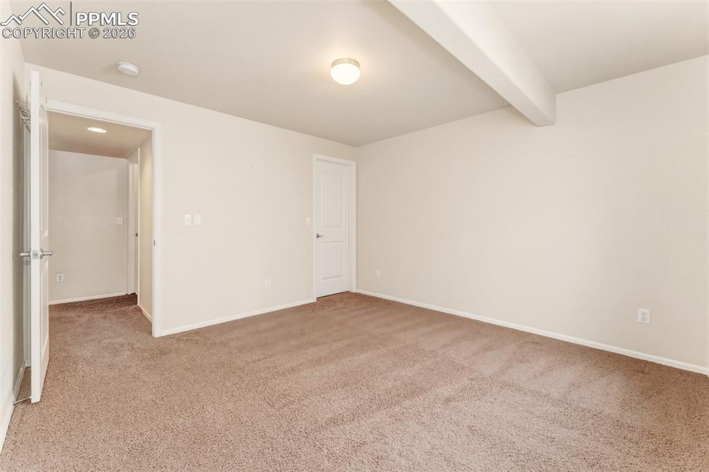 Looking out at the backyard from the dining room/stairs. Nice fence boarders the entire backyard.