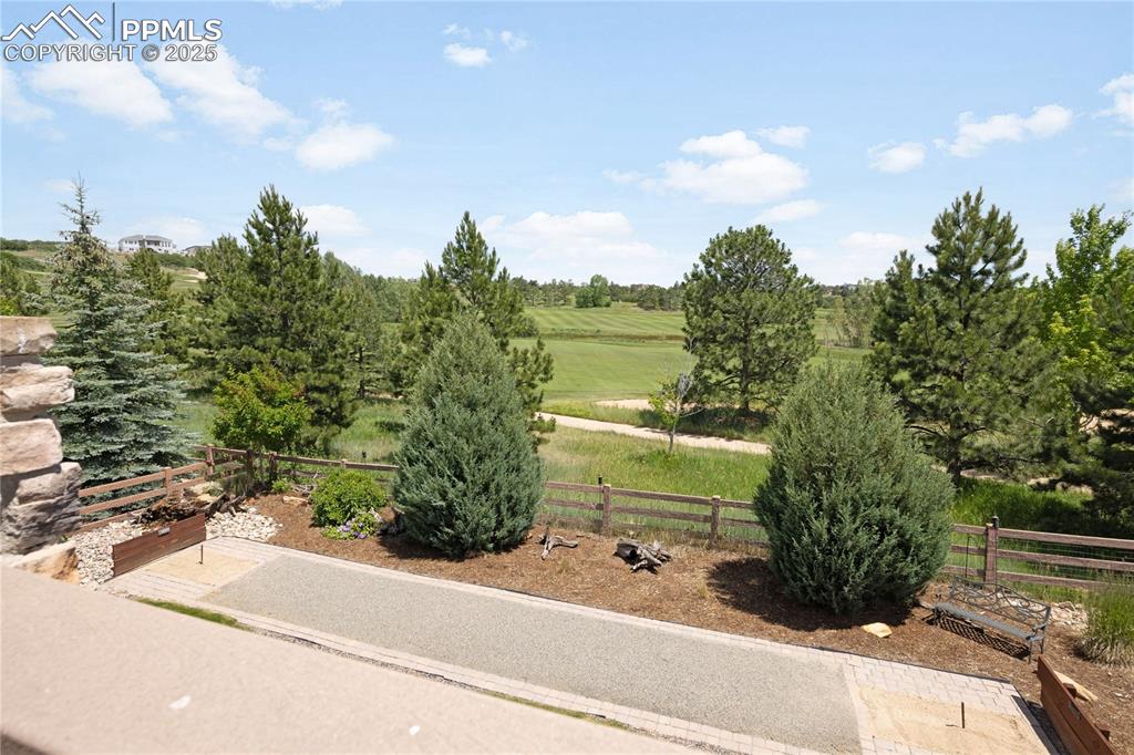 View of yard with a view of golf course