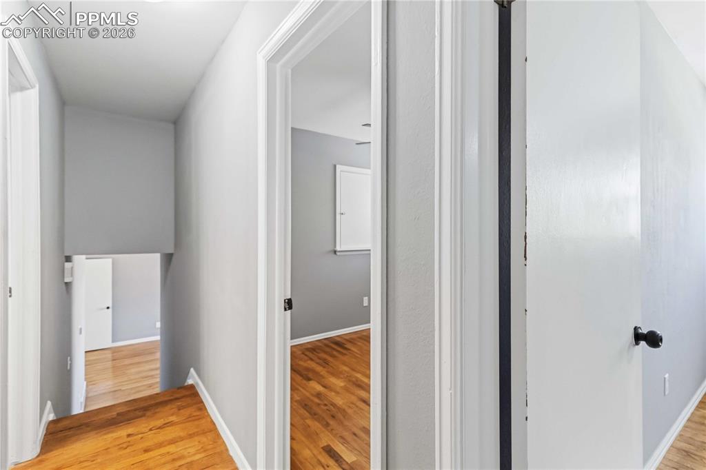 Upstairs to 3 bedrooms and a full bathroom.