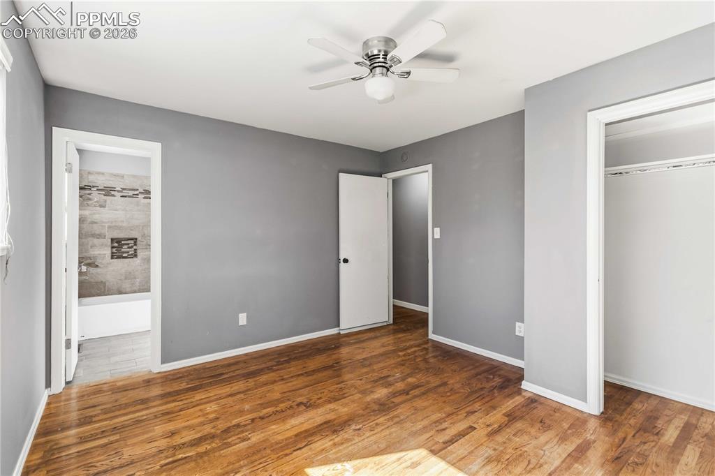 Primary bedroom with full ensuite bathroom.