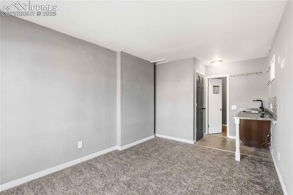 Bonus room with sink and counters, ensuite bathroom with shower