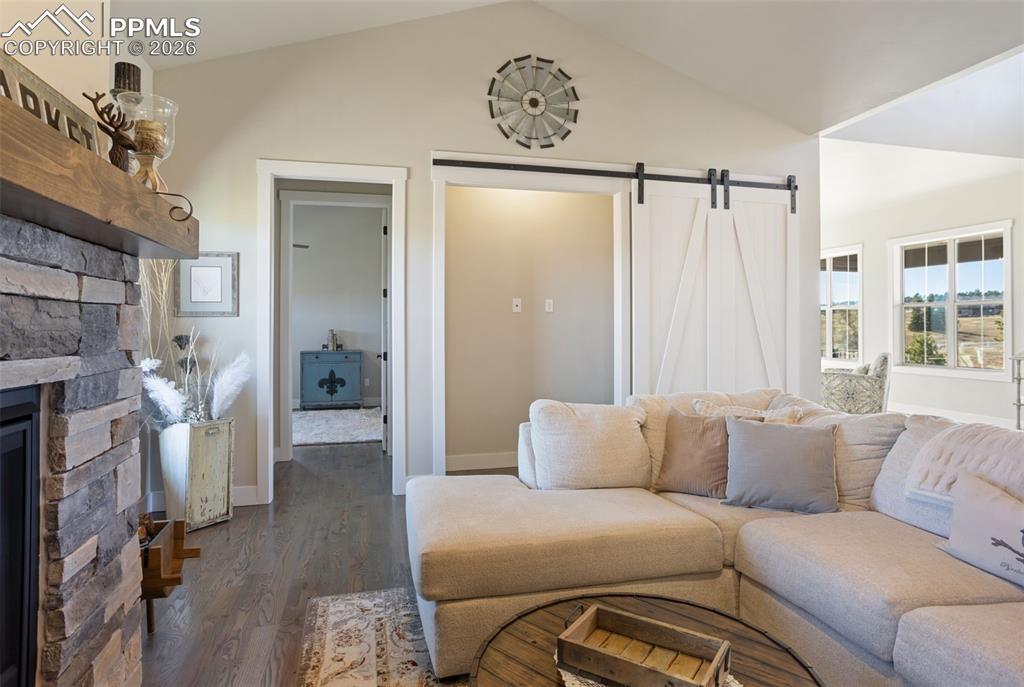 view of media area with barn door open