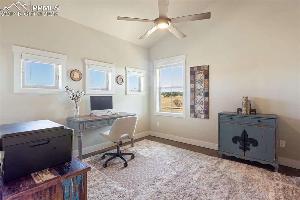 office or bedroom space with walk in closet and attached bathroom