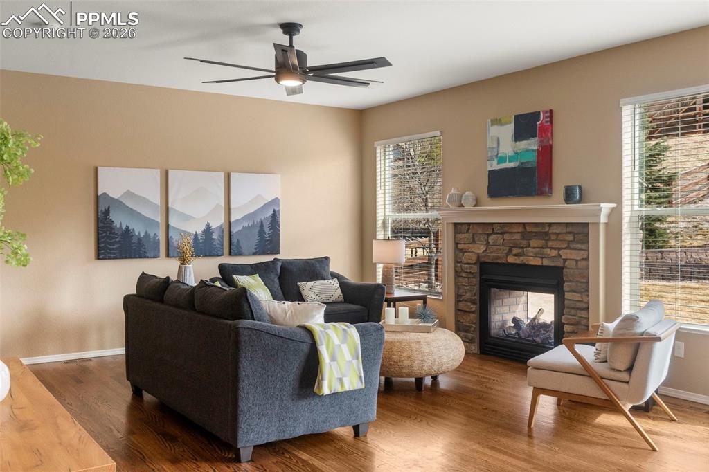 living room with double sided fireplace