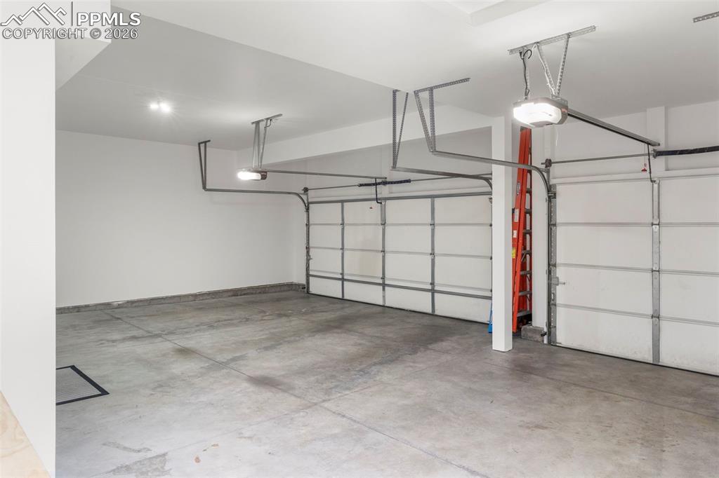 finished garage with work bench. Even with the main level.