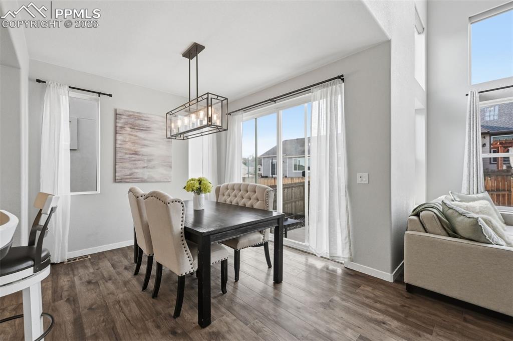 Large dining room with sliding doors out to back patio