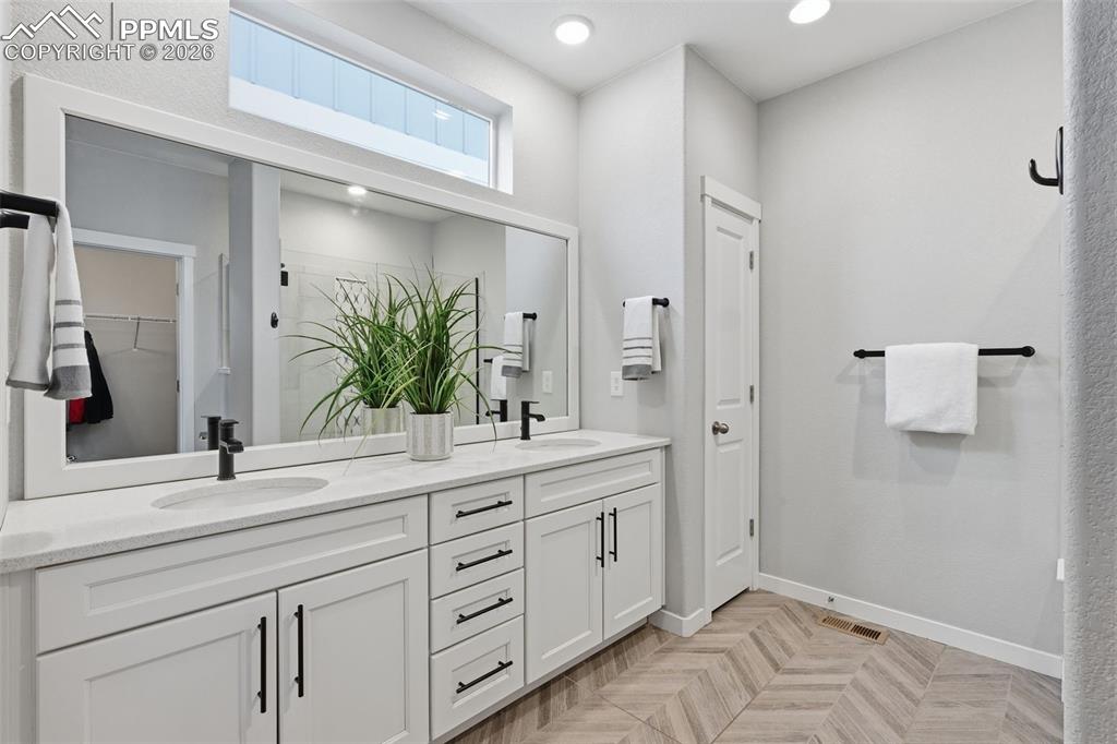 Large Master Bathroom with double vanities