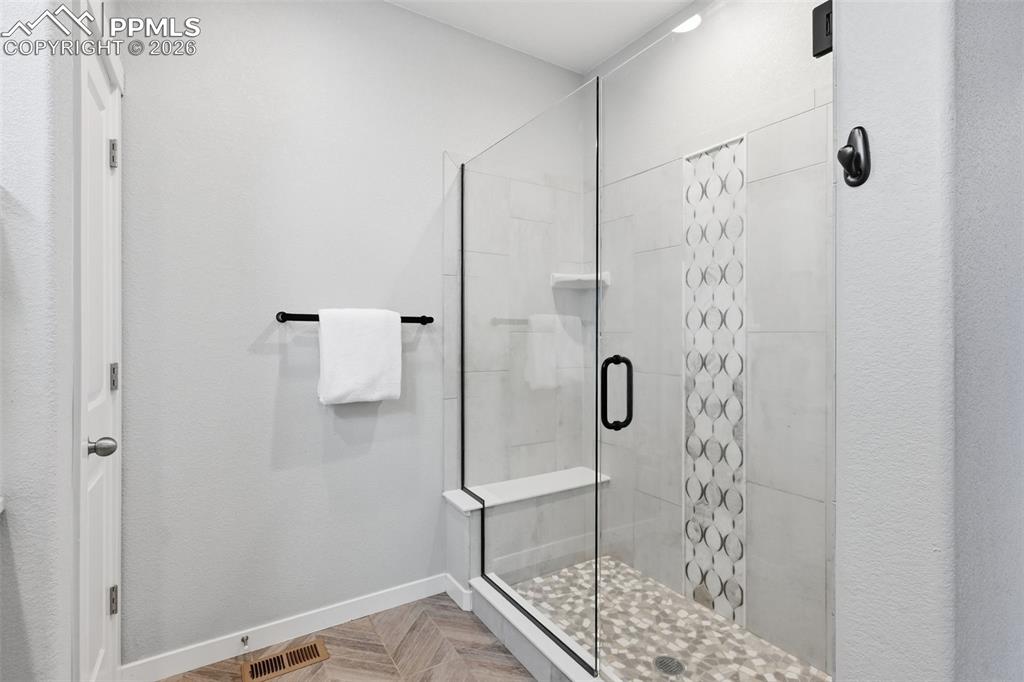 Upgraded tile in the walk-in shower