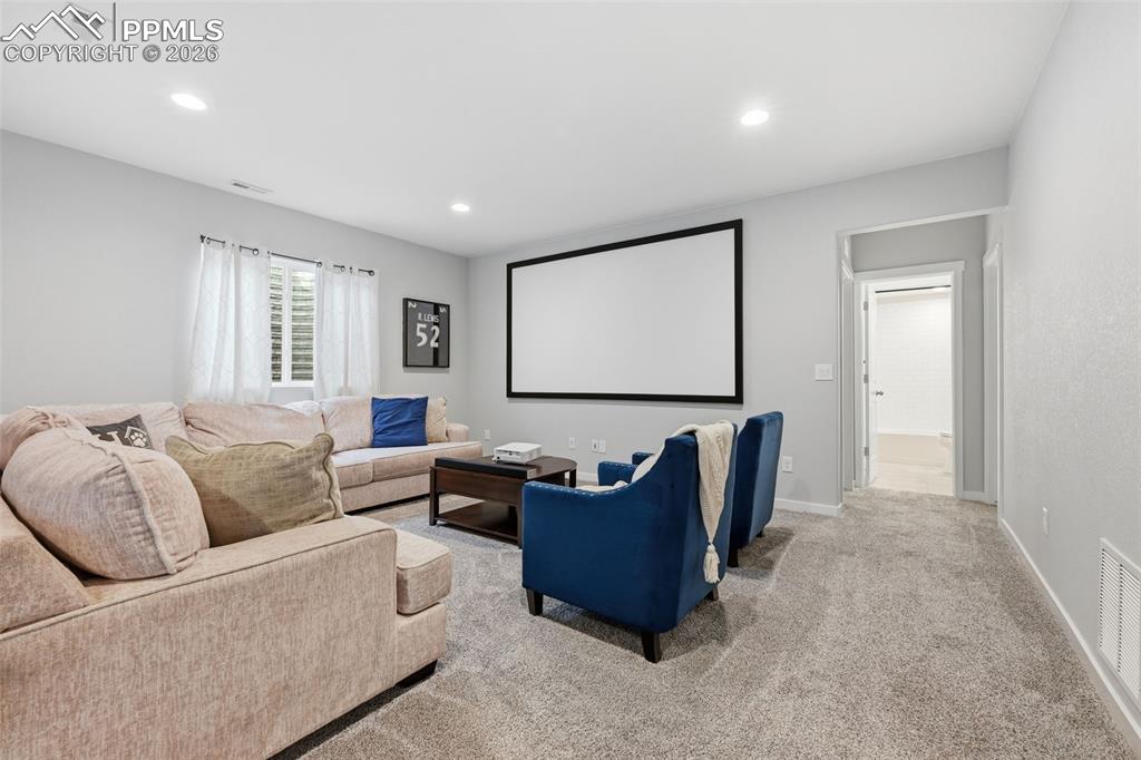 Large basement rec room with projector screen included