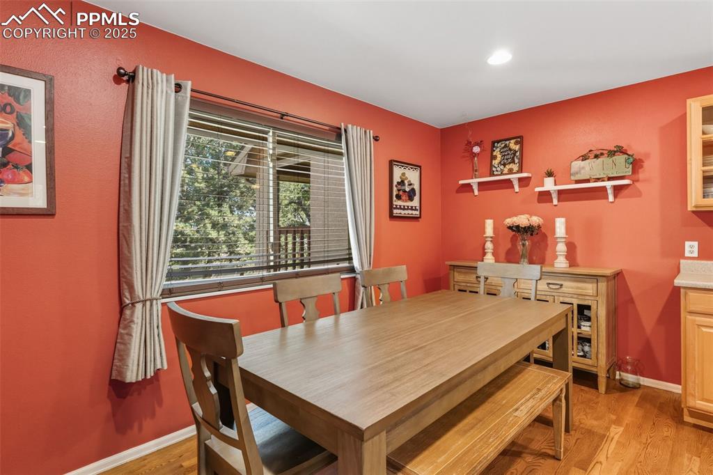 Dining space at the end of the kitchen with natural light