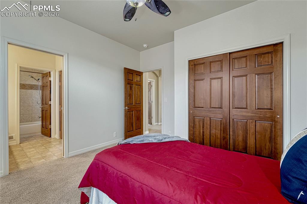 Spacious second upper-level bedroom with ample closet space