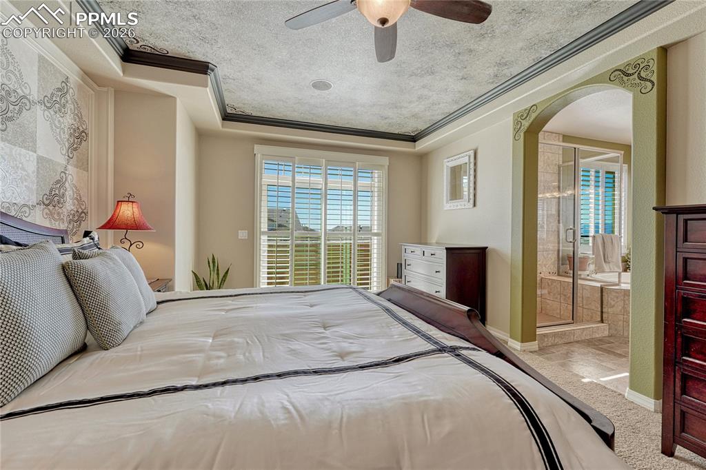 Primary bedroom with an adjoining 5-piece bathroom