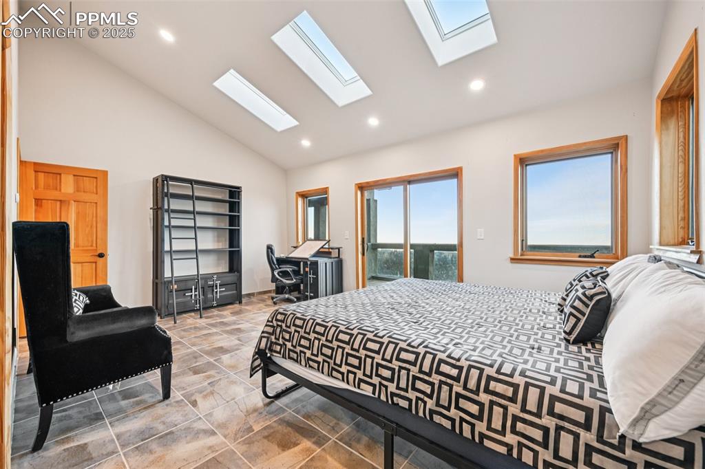 Bedroom 4 with en suite 3/4 bathroom, sky lights, walk in closet and its very own walk out deck