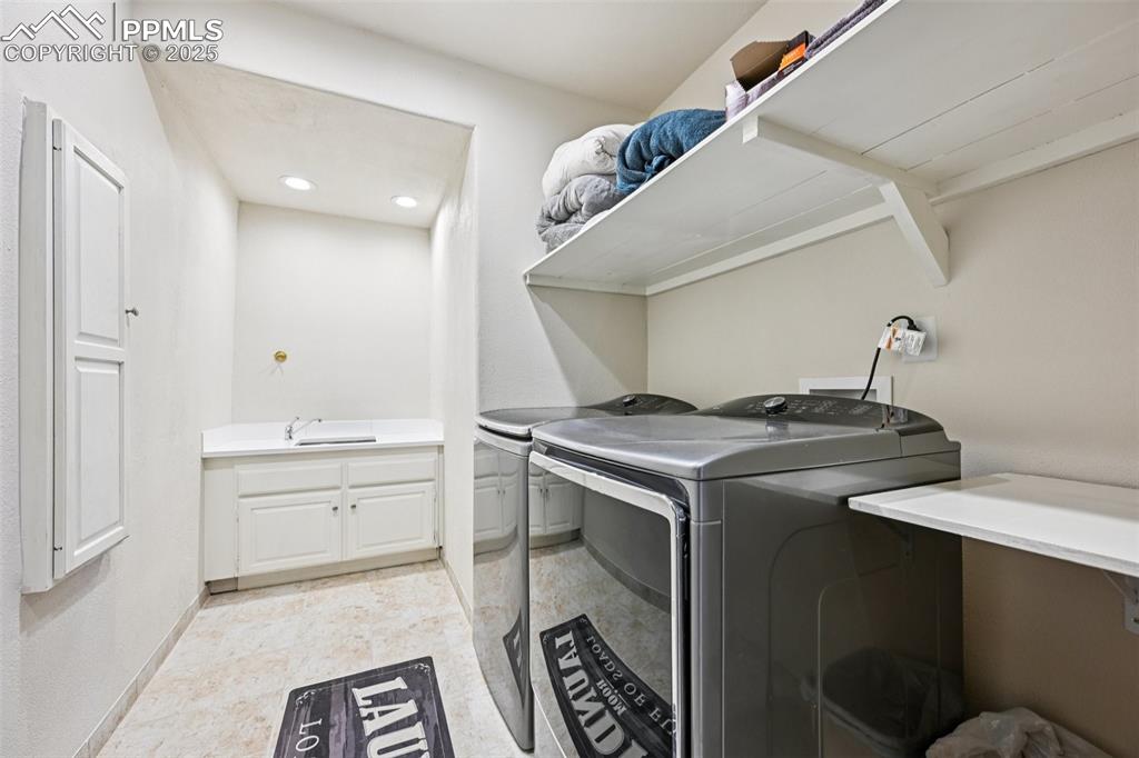 Laundry room with laundry shoot