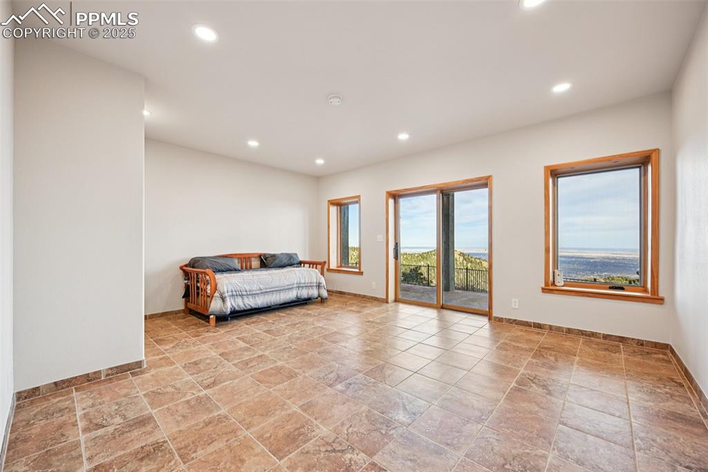 Bedroom 6 with walk out to covered patio