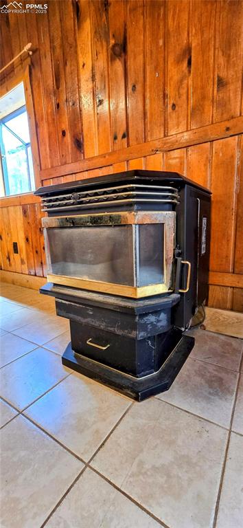 Detailed view of wooden walls and a wood stove