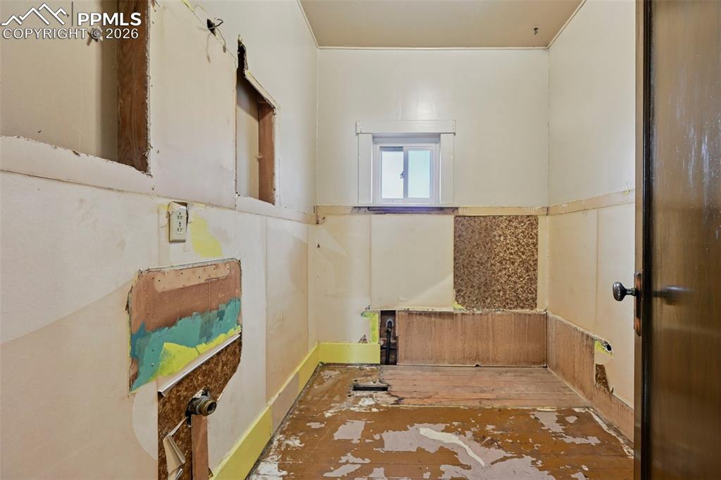 Unfinished bathroom, was used as a closet.