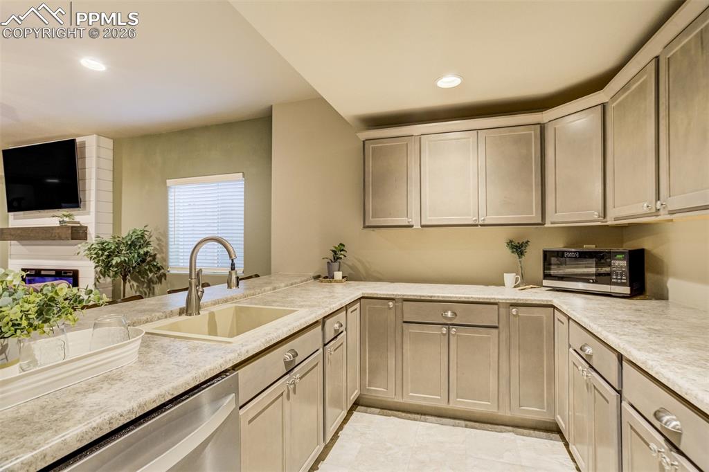 This basement bar is bigger than most kitchens. 