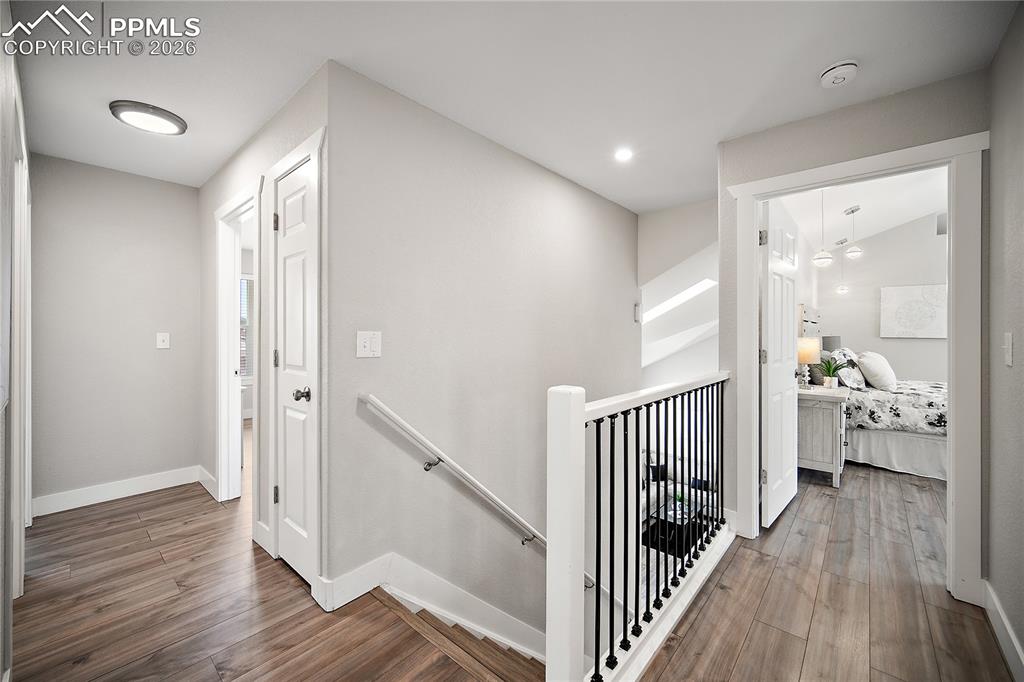 Laminate flooring continues upstairs. 