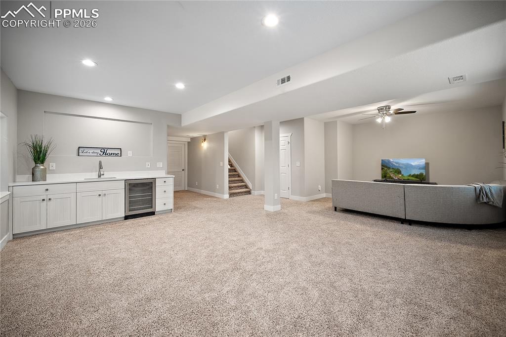 Finished basement with newer carpet, wet bar and endless possibilities. 