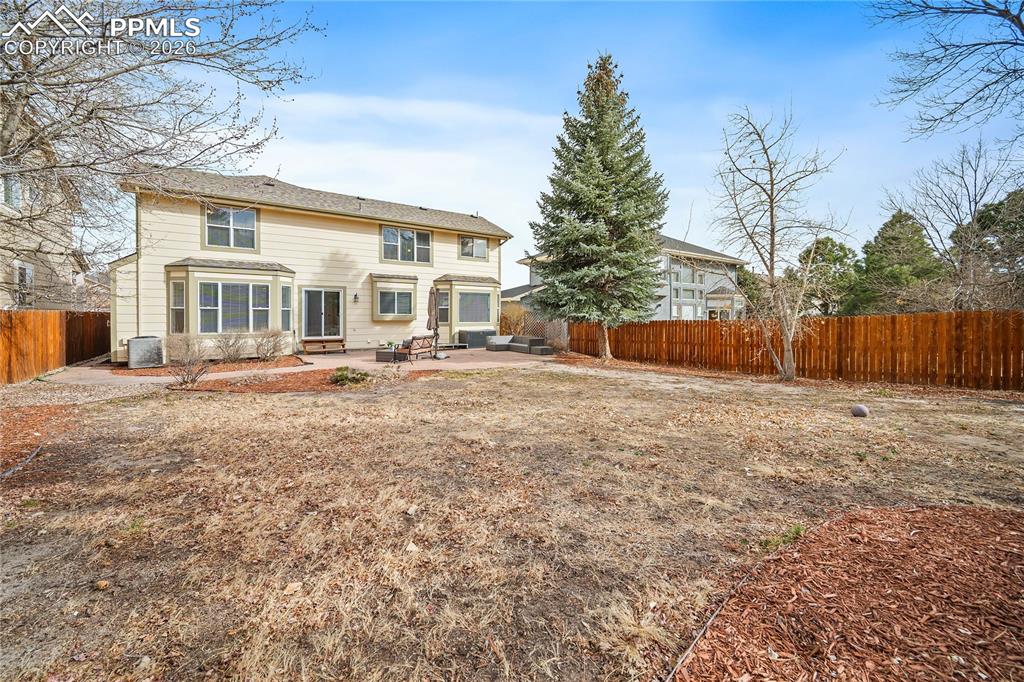 Mature trees and newer fence. 