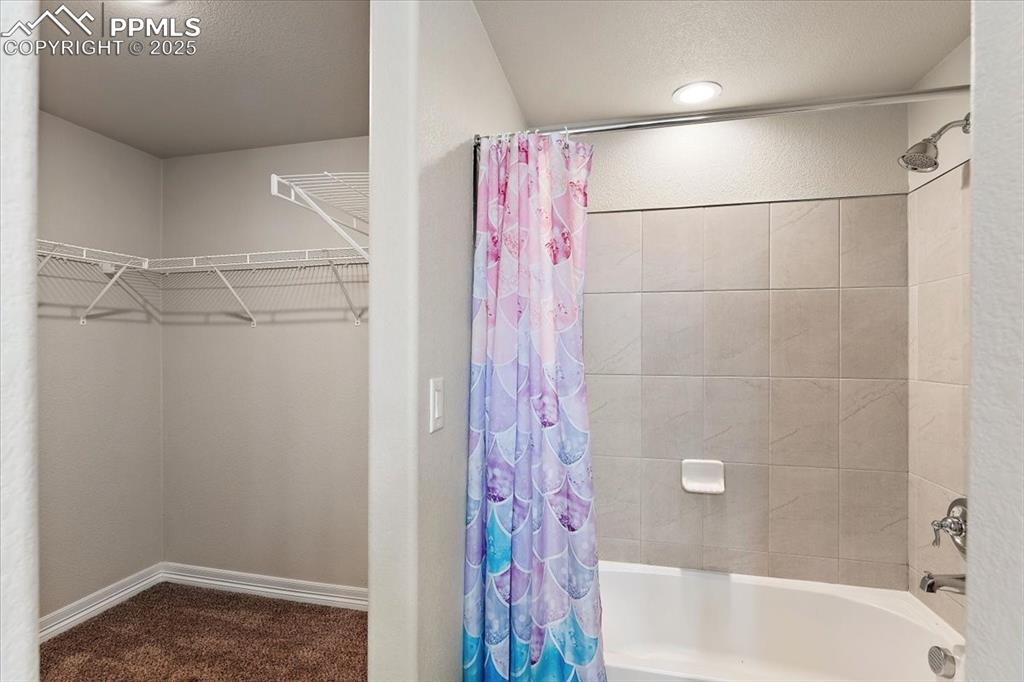 Lower level Primary Suite bathroom #3 and large closet