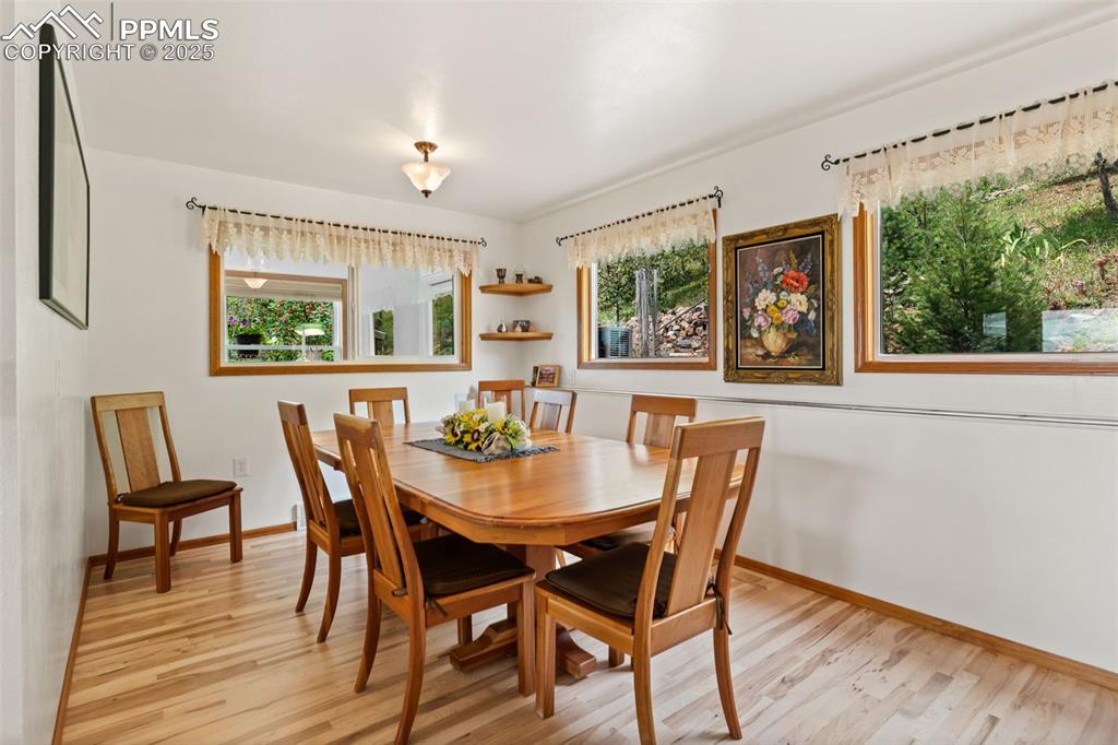 Formal Dinning Room with Large Picture Windows offering Amazing Mountain Views!