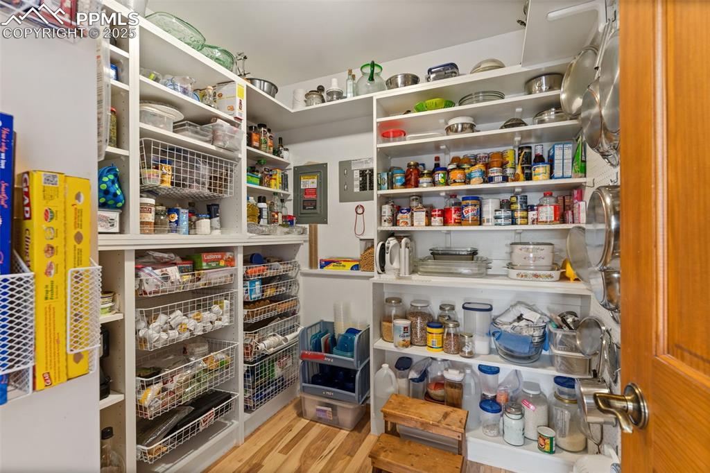 Huge Walk-in Pantry w/Custom Shelves, Pull-out Baskets, & Peg Board to hold Pots! 