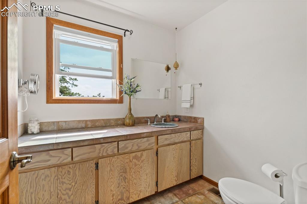 1/2 Bath with Custom Pankratz Pottery Sink Bowl with Upgraded Faucet!