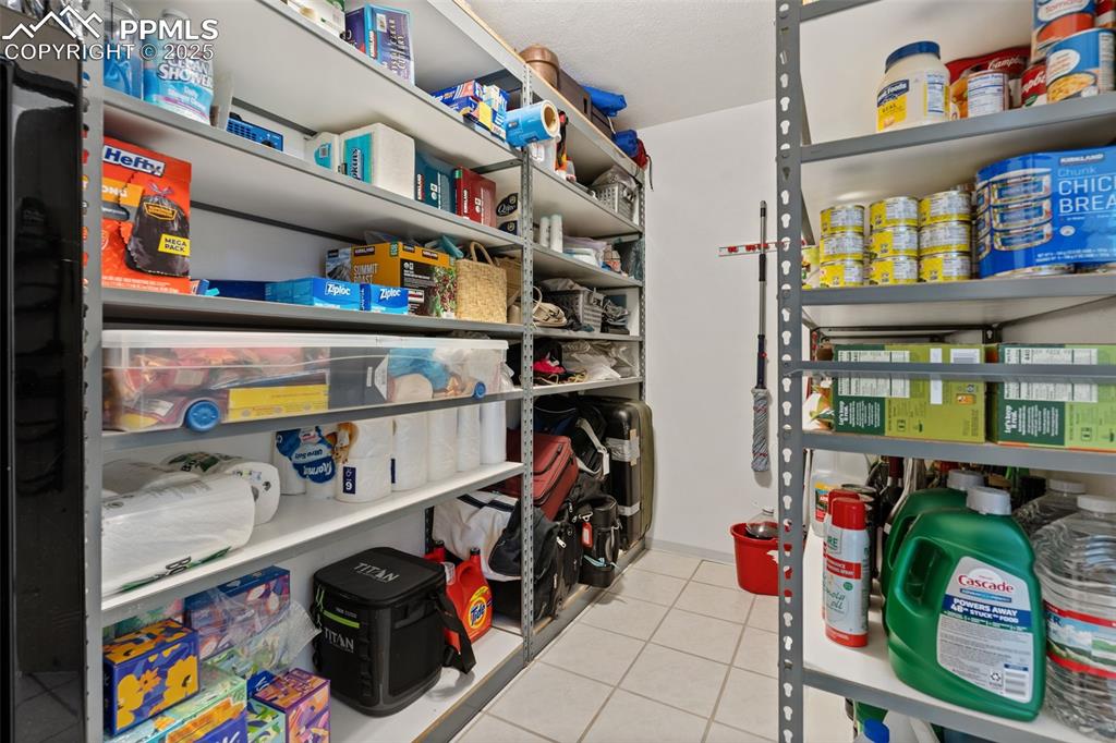 Lower-Level Store Room with Included Storage Shelving!