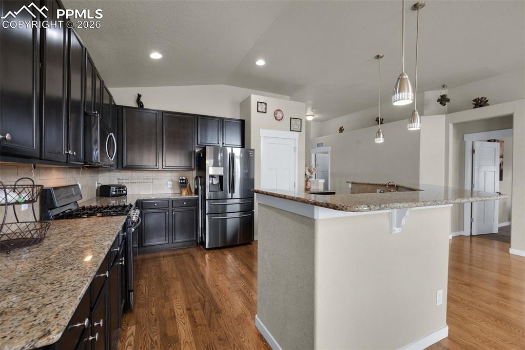 Kitchen showing pantry in background