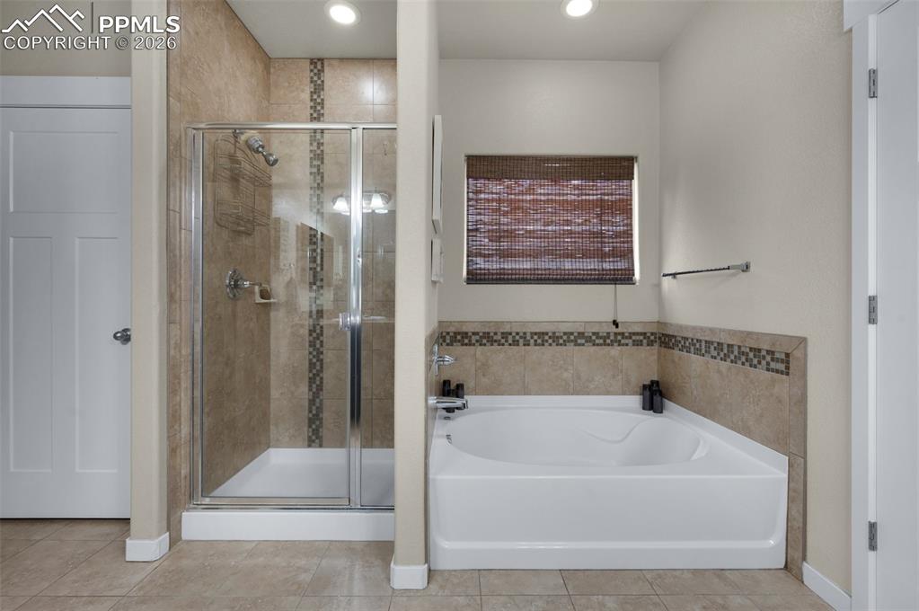 Garden tub, separate shower, and water closet