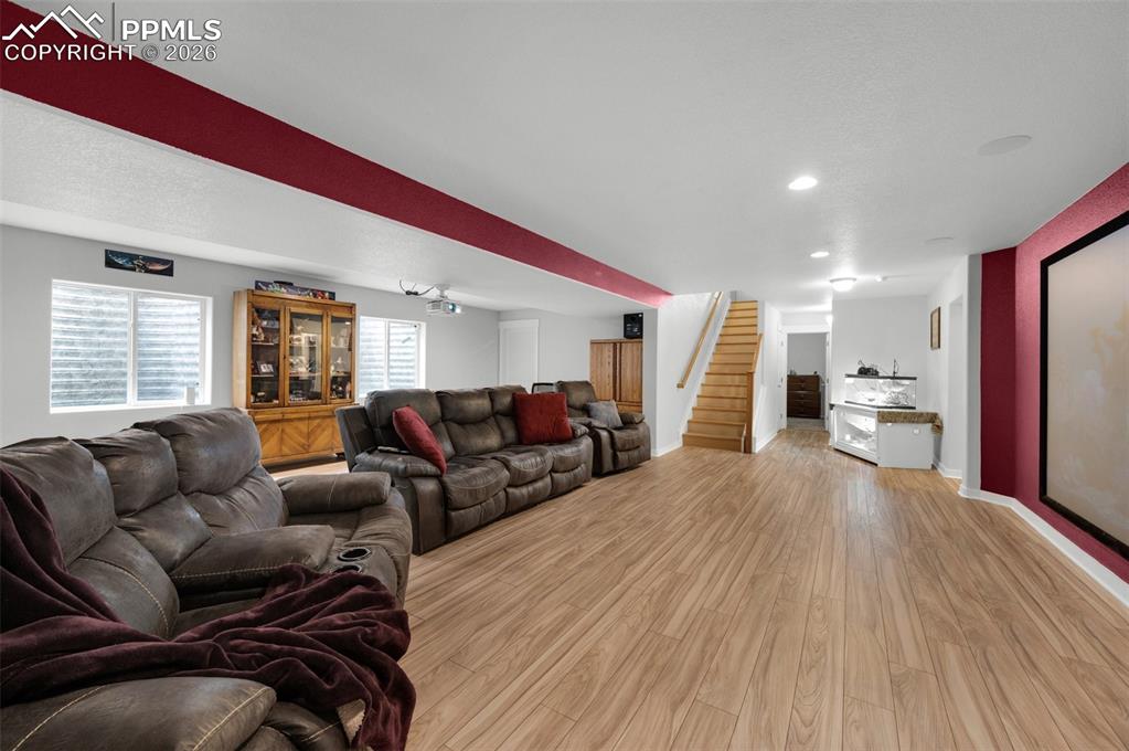 Family and media room, 135" theater screen