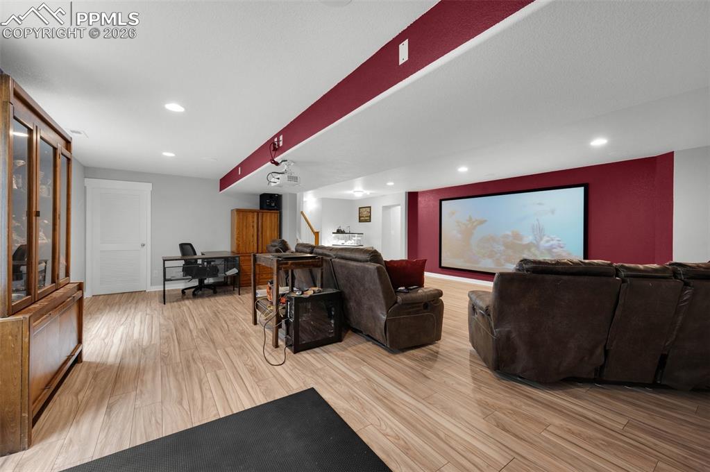 Home theater, new LVP flooring recessed lighting, home theater system