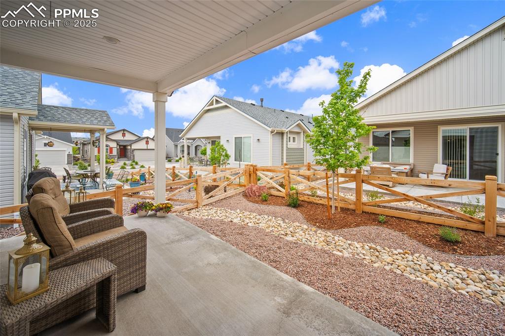 Fully landscaped and covered patio. 