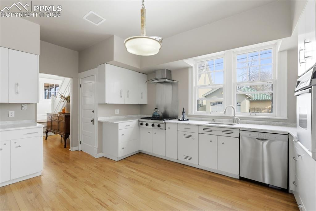 Kitchen with Carrara Marble Tile Countertops