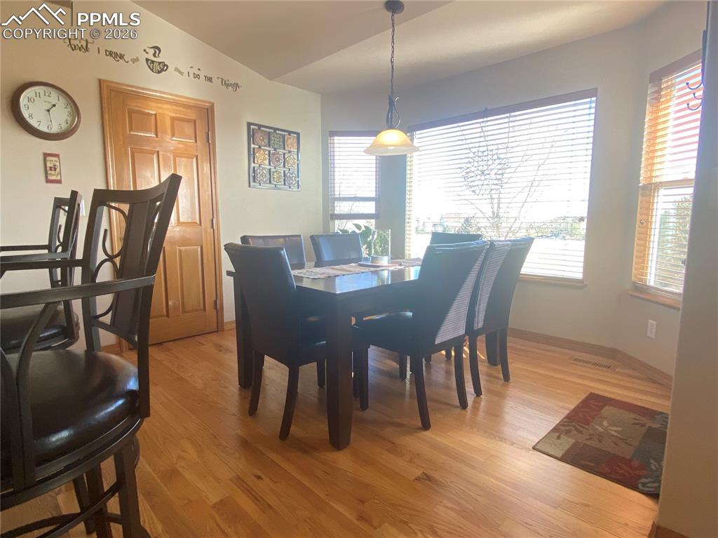 The eat-in dining area offers scenic golf course views, perfect for meals with a relaxing, picturesque backdrop