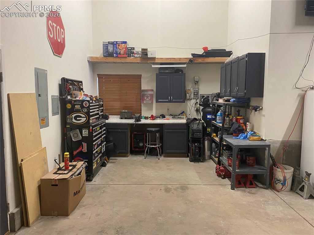 And includes a workshop with a 100-amp electrical sub-panel, offering upgraded power capacity, organized tool circuits, and flexible space for a hobby shop, woodworking, or electrical projects