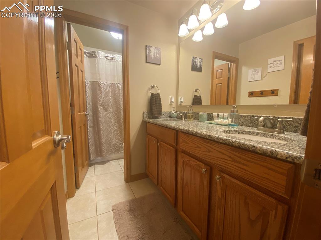 Updated space with granite counters and modern cabinetry upgrades, combining stylish design with functional storage