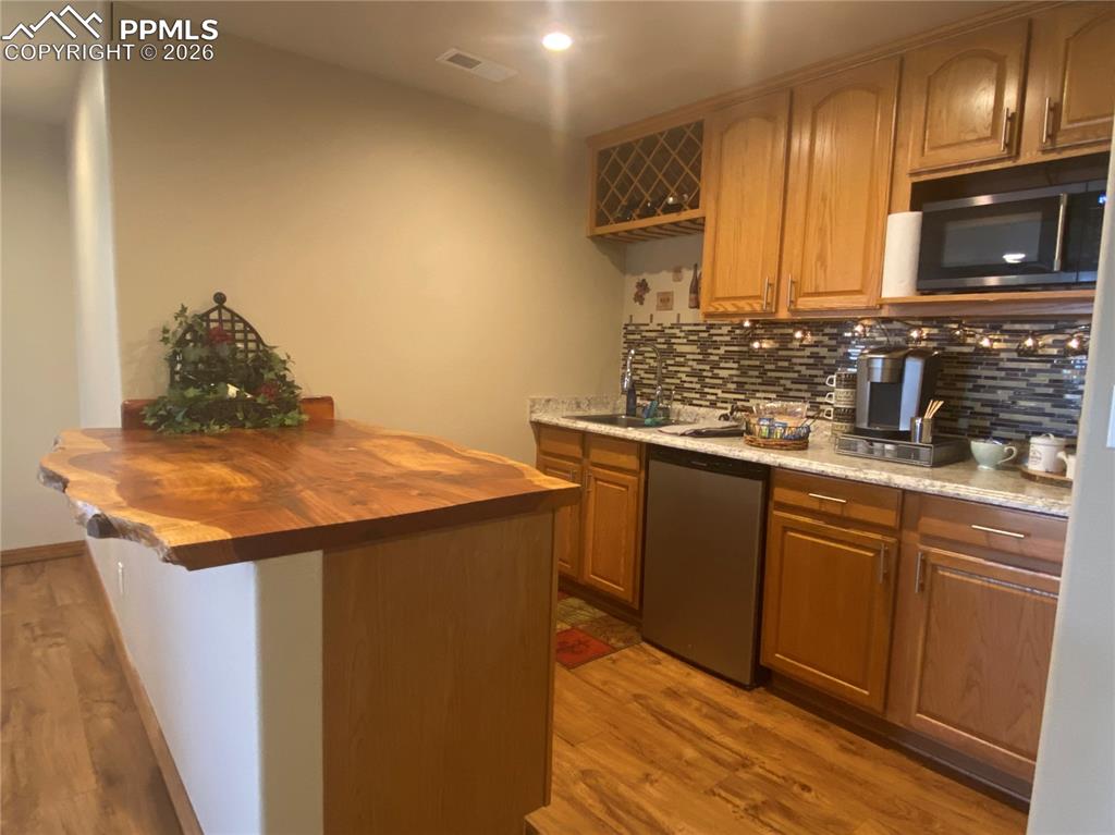More than just a wet bar & featuring a live edge countertop