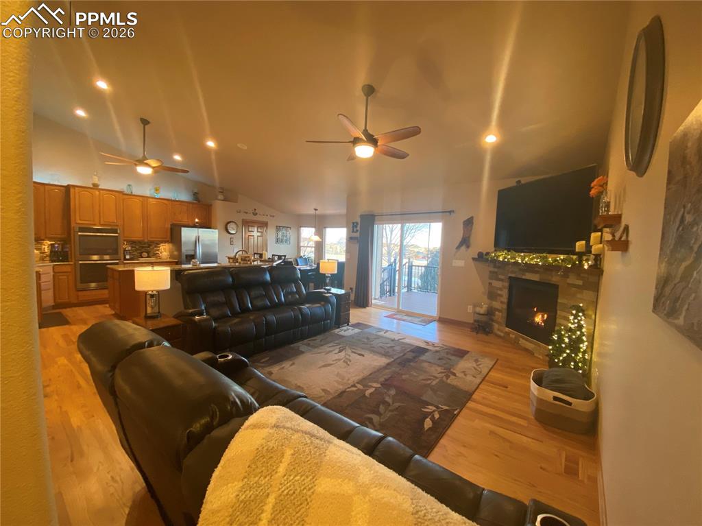 The upgraded open-concept living, kitchen, and dining area features modern finishes, spacious design, and seamless flow—perfect for entertaining and everyday living.