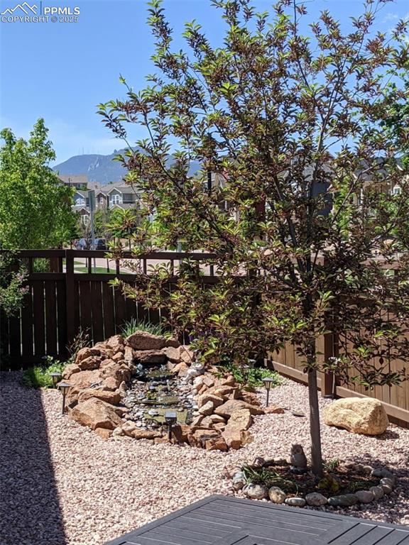 View of yard with a mountain view