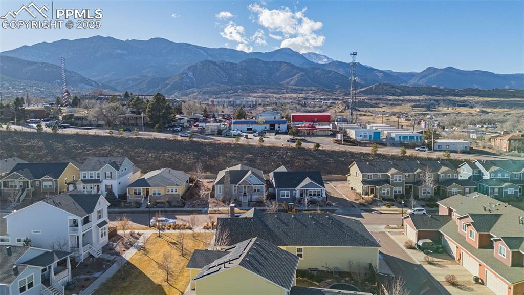 Birds eye view of property featuring a mountain view