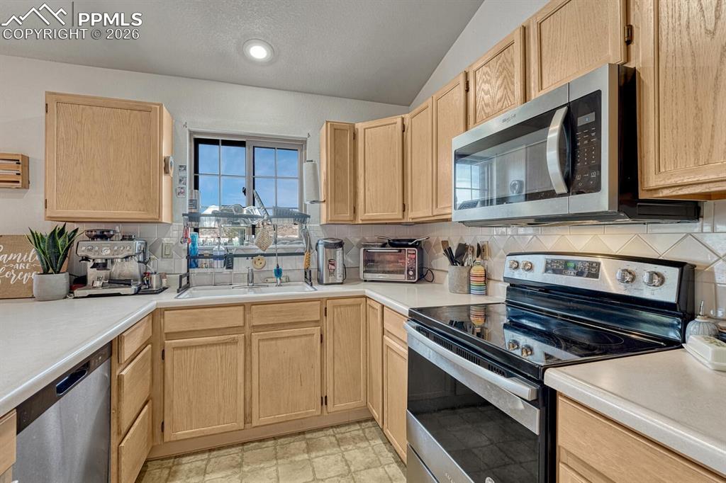 Window at the kitchen sink, lots of light and room