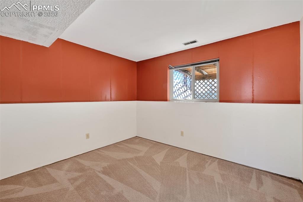 Additional lower level bedroom features ensuite bath