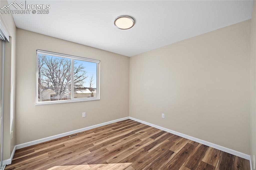 Bedroom 3 new flooring, paint and lighting. 