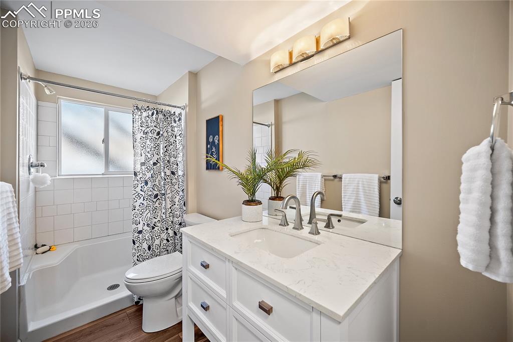 Lower level 3/4 bath. New vanity, flooring, paint and lighting. 