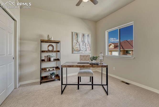 Main level bedroom #2 is located in the front of the house and could be used as an office.